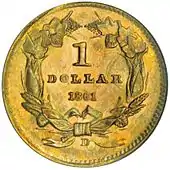 Pièce de monnaie en or comportant les inscriptions 1 Dollar et 1861 en son centre, entourées d'un couronne de feuilles. La lettre D se trouve en bas, au centre.