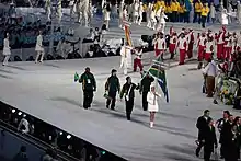 Photographie présentant l'entrée de la délégation sud-africaine à la cérémonie d'ouverture.