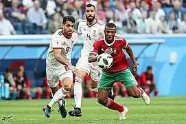 El Kaabi en duel face à Morteza Pouraliganji.