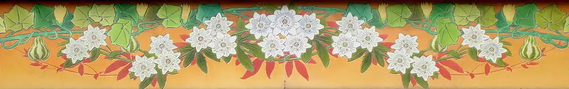 Élément de décor de la façade rue de la Monnaie du magasin 2, en lave émaillée.