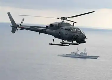 AS-555 de la marine colombienne se préparant à tirer sur le Conolly.