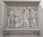 Bas-relief commémorant la visite de moines de l'abbaye de Saint-Riquier à Jeanne d'Arc prisonnière, au château de Drugy