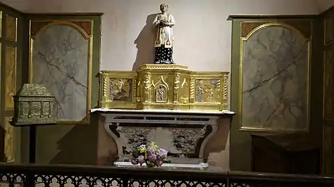 Statue de saint Papoul, reliquaire et tabernacle.