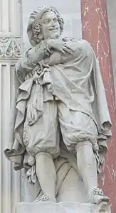 La Comédie, œuvre d'Amédée Doublemard ornant le côté gauche de la façade.