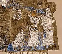 Ambassadeurs de  Chaganian (en) (figure centrale, inscription du cou) et de Tchatch (Tachkent moderne) auprès du roi Varkhuman de Samarkand (648-651 CE, peintures murales d'Afrasiyab, Samarkand,).