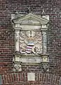 Détail du corps de logis affichant les armes du seigneur Van Arkell et celles d'une dame de Gueldre