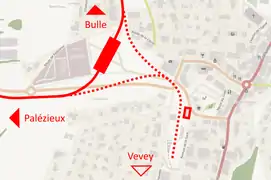 Carte représentant la gare ouverte en 2019 (rectangle plein) et l'ancienne gare (rectangle vide), avec la voie actuelle en trait plein et les anciennes voies en pointillé.