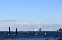 Les concurrents au départ de Brest devant le phare du Petit Minou.
