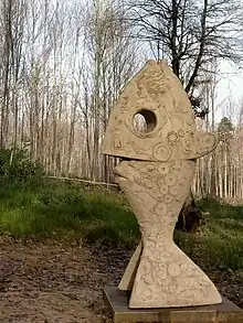 L'homme-poisson, symbole de l'origine de la vie sur terre et de la nécessité de la préservation de l'environnement