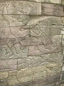Coup de pied délivré à un démon, bas-relief à Banteay Chhmar Angkor aux alentours du XIIIe siècle