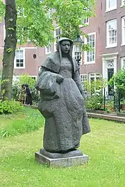 Statue d'une religieuse béguine Amsterdam.
