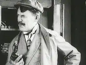 :Iouri Choumski (ru) interprétant le rôle de Bénia Krik