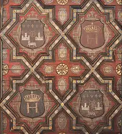 Étoiles à huit branches avec armes de Toulouse, d'Henri IV et croix occitanes.