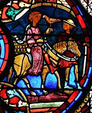 Le damoiseau dans le vitrail de l'Enfant prodigue