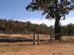 Entrée du parc naturel de Canberra (en) à Red Hill.