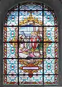 Vitrail relatant la résurrection de la fille d'un sénateur romain par saint Cornély.