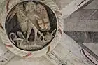 Clé de voûte représentant saint Michel terrassant le dragon.
