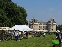Tableau présentant la « Fête des jardiniers » au château du Lude, en 2013.