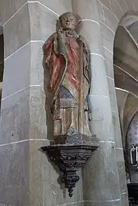 Statue de saint Martial (XVe), polychrome en pierre calcaire, église de Chamboulive.