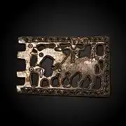 Boucle de ceinture (thème chrétien) en bronze, avant le VIIe siècle.