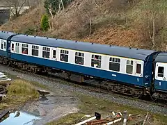 Côté compartiments (une porte supplémentaire).