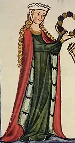 Jeune fille debout, tenant une couronne de fleurs