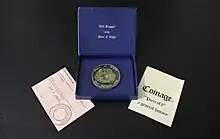 Reproduction d'une pièce en argent dans un coffret