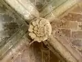 Bas-côté nord, clé de voûte de la 4e travée.