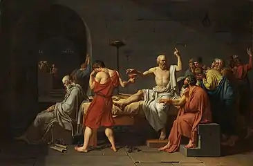 Socrate au centre, dirige sa main vers une coupe que lui tend un homme, autour de lui, ses disciples