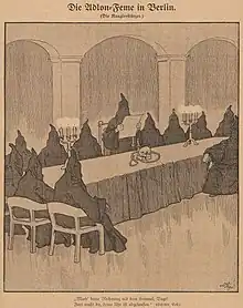 Dessin de presse montrant des individus portant une combinaison avec un cagoule pointue