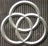 Symbole de l'industrie lourde allemande : les trois roues de chemin de fer sans soudure du groupe Krupp.