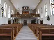 Vue intérieure de la nefvers la tribune d'orgue.