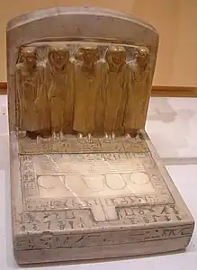 Stèle au défunt et sa famille, table offrande, prov. Abydos, fin XIIe-déb. XIIIe dynastie, Louvre,