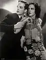 Avec Jean Arthur, dans The Past of Mary Holmes (1933, photo promotionnelle)