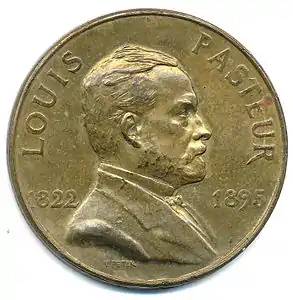 Monnaie de 1/10e d'Europa, portrait de Louis Pasteur (1928), bronze, 32 mm.