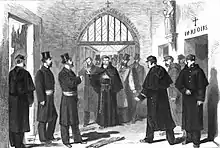 Dessin monochrome représentant des policiers se saisissant d'un religieux.