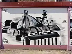 Graffiti représentant la fosse Agache.