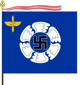 Emblème actuel de l'École de l'air finlandaise (en). La croix gammée est également visible dans l'insigne qui se trouve en haut à gauche, mêlée à une hélice, lequel insigne est proche de l'insigne d'épaule (ou de manche) porté dans l'École.