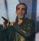 Photographie en couleurs, représentant un homme (Florent Pagny).