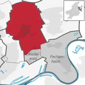 Carte situant le quartier (en rouge) au sein l'arrondissement (en gris foncé) et du reste de la ville (en gris clair)