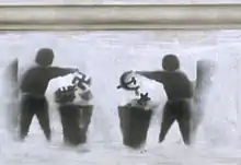 Tag anti-totalitaire sur un mur à Bucarest (2013)