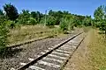 Voie abandonnée en gare de Létrade, à Mérinchal (Creuse).