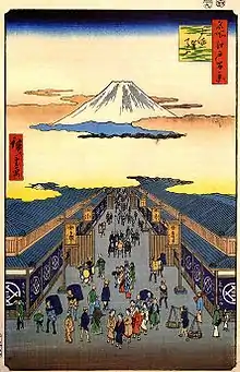 1683. Les grands magasins Mitsukoshi d’Hiroshige situés rue Sugura sur la gauche.
