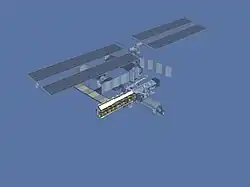 Image de synthèse de l'ISS après STS-112 (octobre 2002) : l'élément S1 est ajouté à côté de S0, sur la gauche de l'image (partie tribord de la Station).
