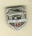 Insigne du 48e RI dur comme roc.