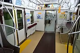 Espace réservé aux fauteuils roulants et poussettes.