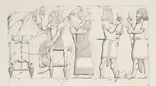 Bas-relief du palais de Khorsabad représentant un banquet à la cour, avec des coupes à boire en métal. Copie par Eugène Flandin.