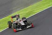 Photographie de Kimi Räikkönen en dérive dans les dernières minutes de la session