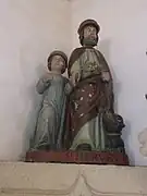 Saint Hervé entouré de Guiharan et du loup apprivoisé.