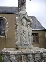 Détail d'un des personnages au pied de la croix.